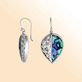 Teardrop silver earrings featuring Abalone Shell and ornate Bali scroll detailing.